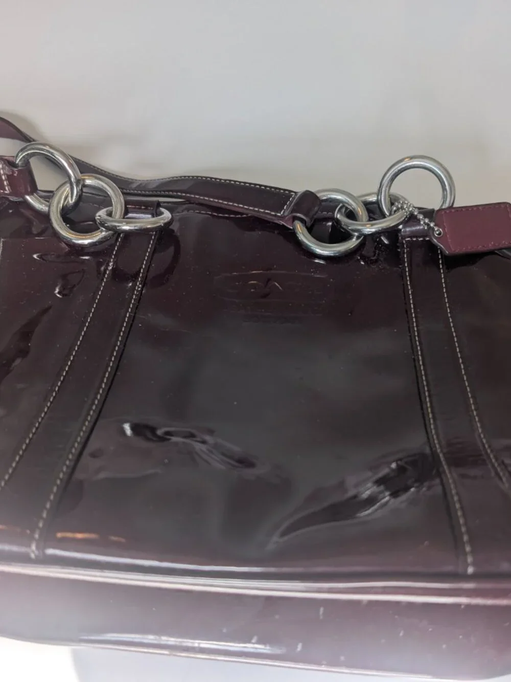 Coach Plum/Burgundy patent leather handbag